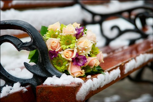 Artistic floral arrangement showcasing various flowers